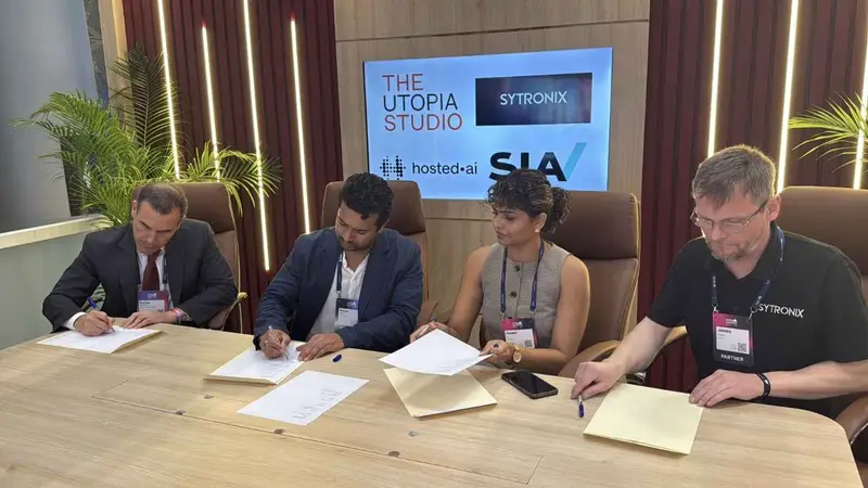 Representatives from The Utopia Studio, Sytronix, Hosted.ai, and Sia Partners signing the infrastructure partnership